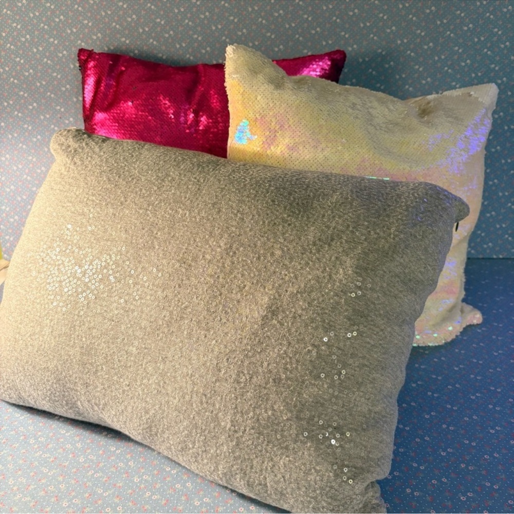 A Mismatched Set of 3 Accent Pillows; Sequinned Pink, Cream and Grey